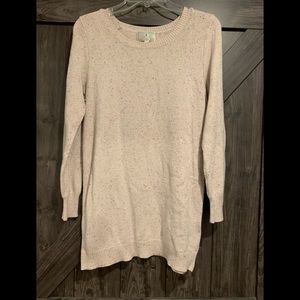 Adorable cream sweater with zippers up the side
